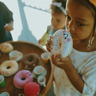 Häkel-Babyrassel, Donut/gelb | Pebblechild - toietmoi-laboutique